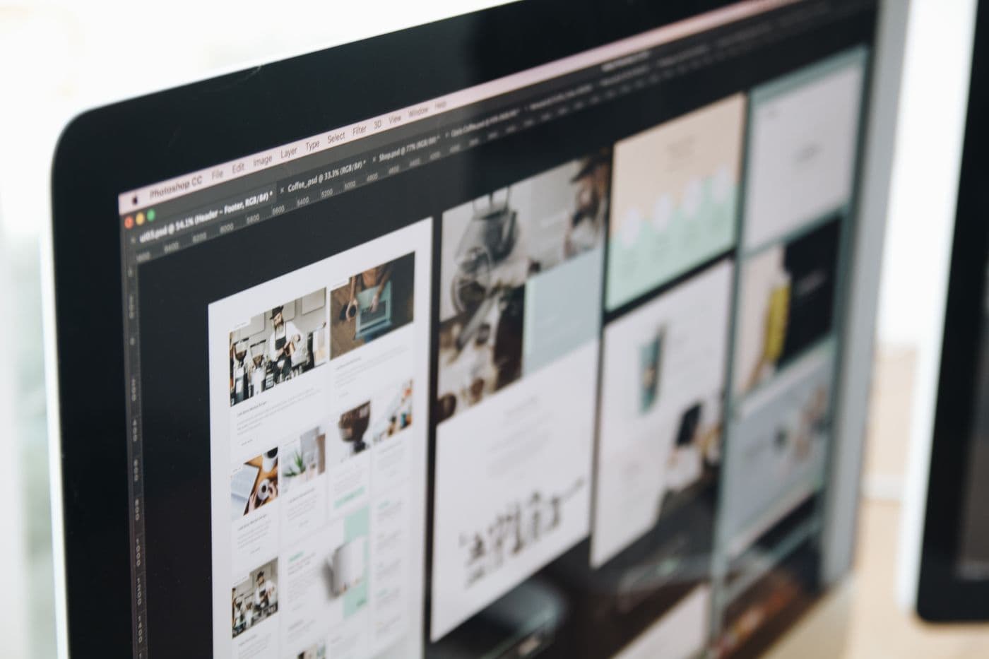 A designer customizing a website layout and design components on screen