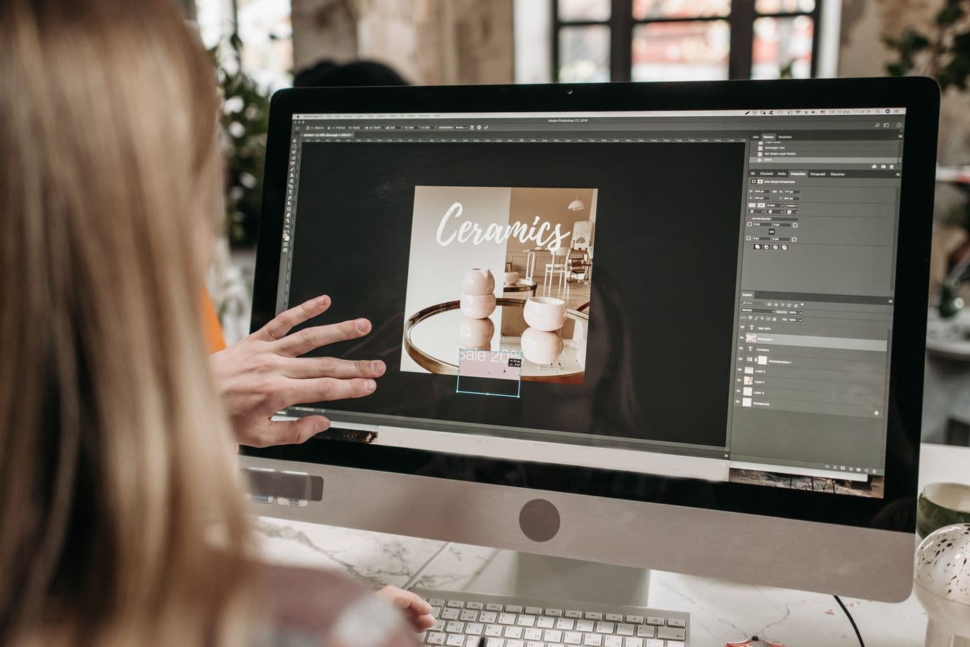 A designer crafting a bespoke, high-fidelity website design
